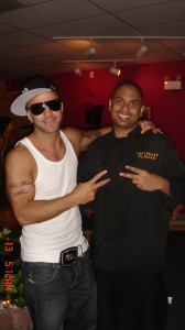 DJ Nasty Naz & R&B Singer Karl Wolf at Caribbean Flavas after the show. He was LOVING our Jerk Chicken.